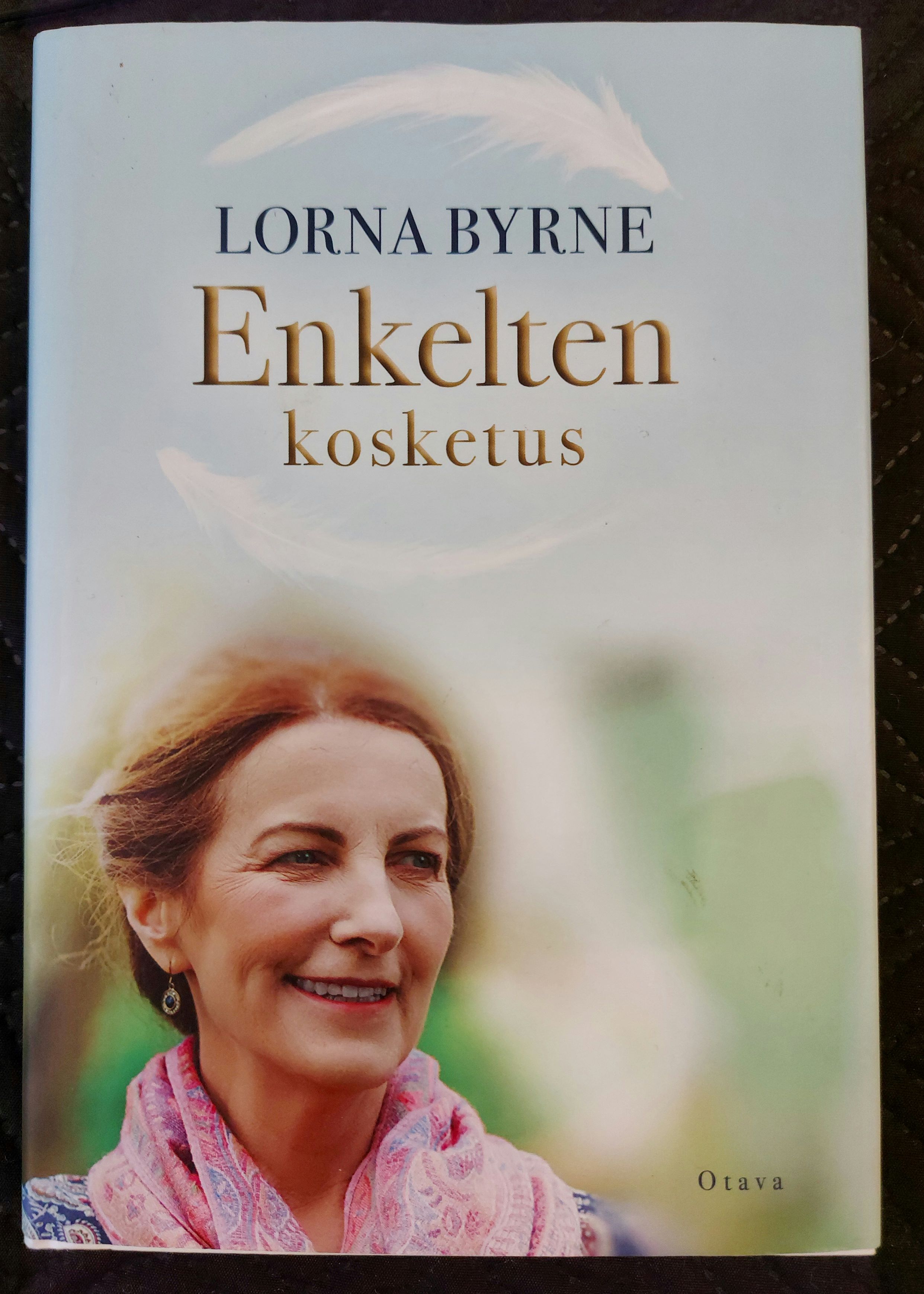 Enkelten kosketus etukansi